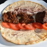 Beef Steak Kebab Wrap · Onion, tomato & sumac.