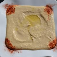 Hummus · Vegetarian.

 * Served with Pita Bread.