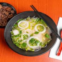 House Grilled Beef Pho · House made beef broth with rice noodles, white onion, scallion and cilantro. Served with bea...