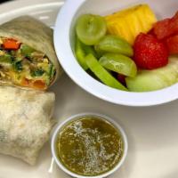 #9 Breakfast Burrito · 2 Scrambled Eggs, Hash Browns, your  choice of Bacon, Ham or Sausage, mixed cheese. Served w...