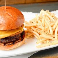 Big Western Rio Burger · Half pound of Angus burger, applewood smoked bacon, fat onion rings, Tillamook cheddar, and ...