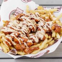 Buffalo Fries Large · All natural hand breaded, diced chicken breast, sauced your way, and drizzled with our signa...