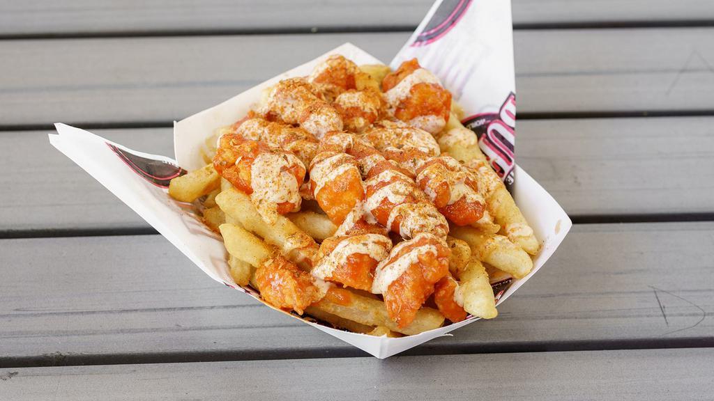 Buffalo Fries Small · All natural hand breaded, diced chicken breast, sauced your way, and drizzled with our signature special sauce.  All on a bed of golden crisp fries.
