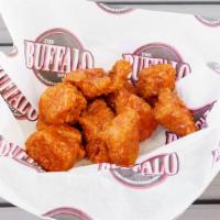 50 Boneless Wings · Choose up to four sauces and five dressings.