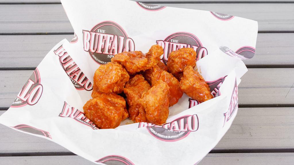 20 Piece Boneless Wings · Comes with two sauces.