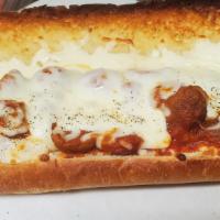 Meatball Sandwich · Beef meatball with tomato sauce, caramelized onion, mozzarella cheese, butter.