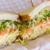 Egg Salad · Egg salad on of choice of bread with tomato, lettuce, sprouts, cucumbers.