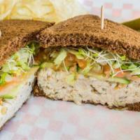 Tuna Salad · Tuna salad on choice of bread bread with carrots, cucumber, tomatoes, lettuce, sprouts.