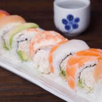Rainbow Roll · Inside - crabmeat, avocado. 
Outside - tuna, salmon, white fish, shrimp, avocado.