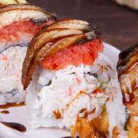 Super Delsushi Roll · Inside - shrimp tempura, crabmeat, avocado. Outside - spicy tuna, unagi, avocado.