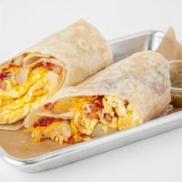 Bacon Breakfast Burrito · Flour tortilla with scrambled eggs, bacon, hash browns and cheddar cheese!