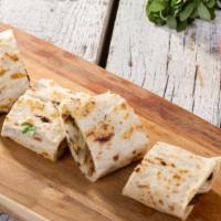 Chicken And Gyro Wrap · Delicious juicy chicken and gyro meat with lettuce, onions, tomatoes, salata, tzatziki sauce...