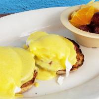 Eggs Benedict · 2 Poached Eggs + Hollandaise,
Ham + English Muffin + Breakfast Side.  Add protein, pancake, ...