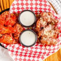 Bone In Wings (10) · Our brand new  Bone in Wings.  Your choice of one of our 6 enticing flavors. Served with you...