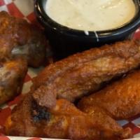 Bone In Wings (5) · Our brand new  Bone in Wings.  Your choice of one of our 6 enticing flavors. Served with you...