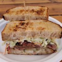 Smoked Brisket · smoked prime brisket, fermented pickles, coleslaw, green-garlic aioli, country loaf.