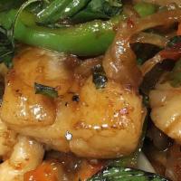 Prawn And Scallop Basil · Prawn and scallop sauteed with bells, onlons, fresh garlic, basil leaves in authentic Thai s...