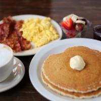 Pancake Combo · Two buttermilk pancakes served with two eggs and choice of four bacon, four sausage links or...