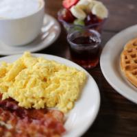 Waffle Combo · Old fashioned waffle served with two eggs any style and choice of four bacon, four sausage l...