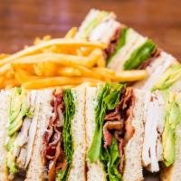 Club Sandwich · In-house roasted turkey, bacon, lettuce, tomato and mayo on your choice of toasted bread.
