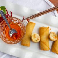 Thai Egg Roll · Deep-fried egg roll skin wrap with vegetable served with sweet and sour sauce.