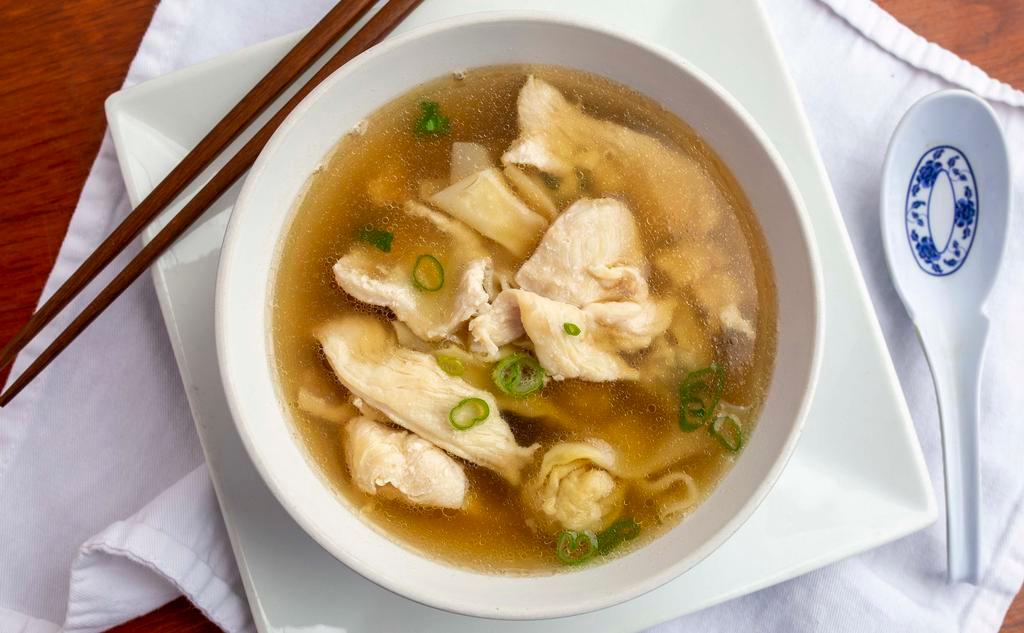 Wonton Soup · Stuff ground pork and shrimp wontons served in a clear broth with chicken, shrimp and vegetables.