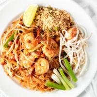 Pad Thai · Stir-fried thin rice noodles, tofu, bean sprouts, crushed peanuts, scallions, and egg with c...