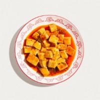 Mapo Tofu · Silken tofu, sliced pork, scallions, wok-tossed in spicy szechuan soy chili sauce. Served wi...