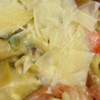 Shrimp Pasta · Grilled shrimp, roasted poblano rajas, lime cream sauce, fresh garlic, diced tomatoes, pappa...