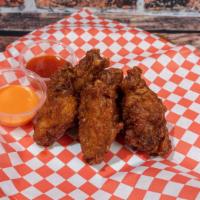 Soy Garlic Wing · Thin layer of hand battered flour crispy chicken with hand brushed ZZanG special soy garlic ...