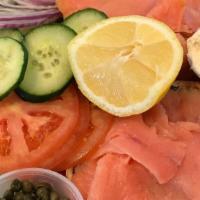 Key To The Lox (Lox Platter) · Smoked salmon topping on your choice of bagel and cream cheese served open face with double ...