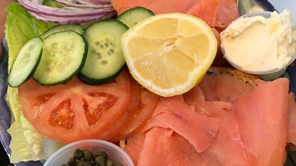 Key To The Lox (Lox Platter) · Smoked salmon topping on your choice of bagel and cream cheese served open face with double portion of lox accompanied with lettuce, tomato, cucumber, onion, capers and lemon on side.