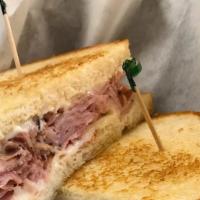Hot Ham & Cheese · Served on grilled sourdough with melted baby Swiss.