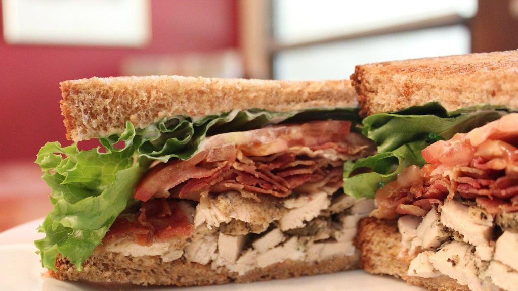 Chicken & Bacon Club · Cold sliced roasted chicken breast served on toasted wheat with mayo, lettuce, tomato, and bacon.