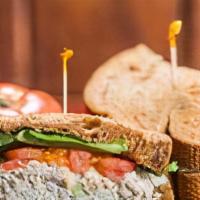 Albacore Tuna Sandwich · Tossed with mayo, celery, red onion, and sweet pickle relish served on squaw bread with lett...
