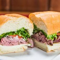 Roast Beef · Medium rare shaved top round of beef, sliced thin with Provolone cheese, fresh lettuce, toma...