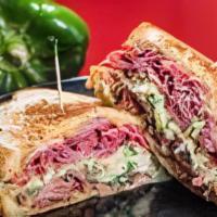 The New Yorker · Over 3/4 pound of our pastrami and corned beef served on rye bread with Swiss cheese, Russia...