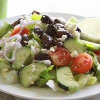 Greek Salad · Iceberg and romaine lettuce, Feta cheese, tomatoes, cucumbers, red onions, Greek olives, wit...