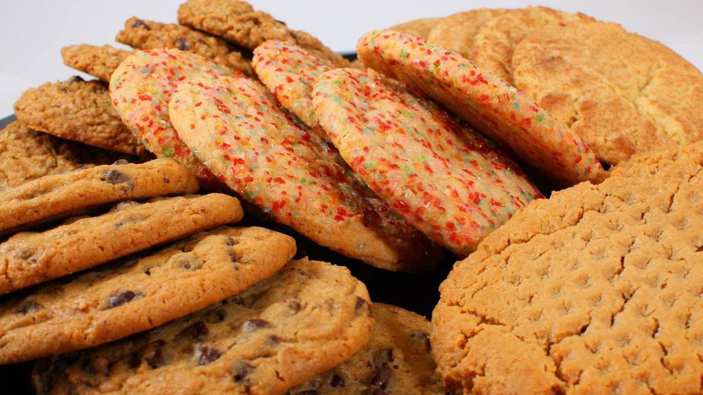 Giant Homemade Cookies · Chocolate chip, peanut butter cookies, snickerdoodle, rainbow sugar, oatmeal raisin, oatmeal chip nut.
