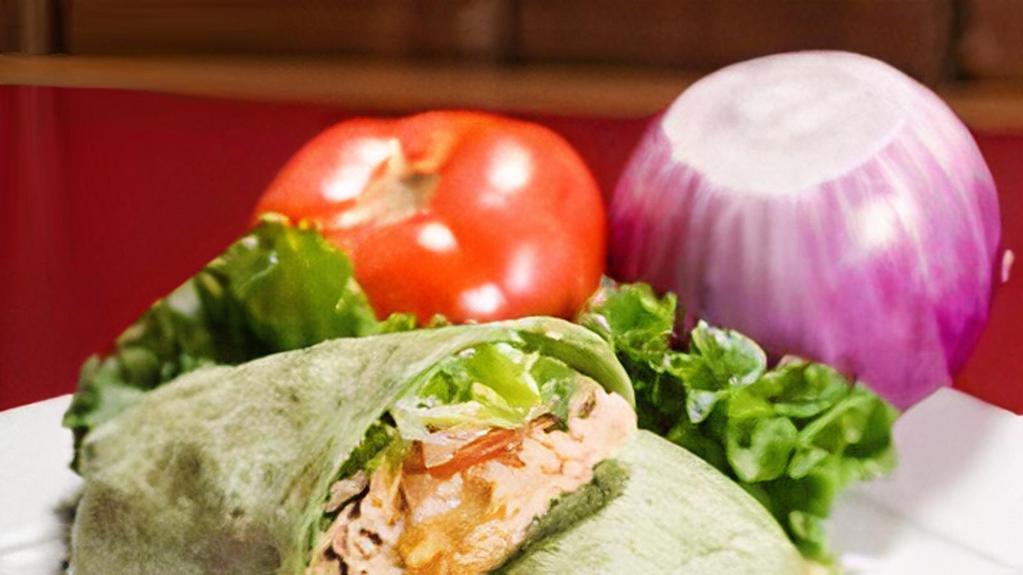 Sequoia Chicken Wrap · Marinated chicken breast, romaine, homemade ranch, tomato, Cheddar and Pepper Jack cheese, all wrapped in a tasty spinach tortilla.