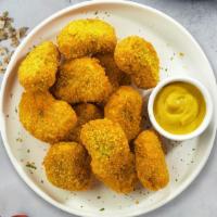 Cheeky Chicken Nuggets · Bite sized nuggets of chicken breaded and fried until golden brown. Served with your choice ...