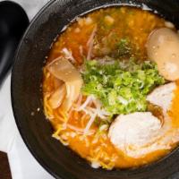 Spicy Miso Ramen · Pork broth soup, miso base with extra fat, noodle, half boiled egg, sliced roast pork, bean ...