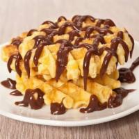 Chocolate Waffle · A fluffy Belgian waffle slathered in chocolate sauce and topped with maple syrup served with...