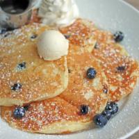 Buttermilk Pancakes · Served with butter, powdered sugar, maple syrup, whipped cream