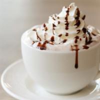 Hot Chocolate · made with Ghirardelli Chocolate and Topped with Whipped Cream.