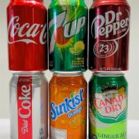 Can Sodas · 12 oz.   Coke, Dr.pepper, 7-up, Ginger Ale,
, Diet Coke