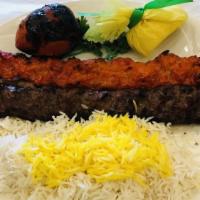 Shish Kebab · Charbroiled juicy large chunks of filet mignon, marinated, skewered with onions, tomatoes an...