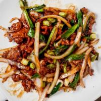 Mongolian Beef With Onion · sliced flank steak with onions & scallions