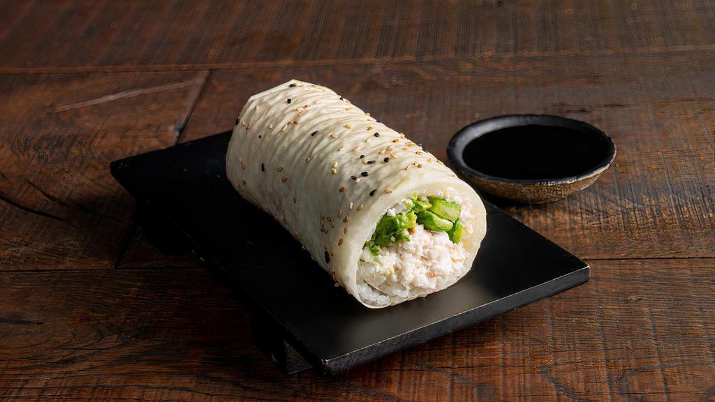 Kanikama Sushirrito · Kanikama, Ponzu mayo, cucumer, avocado, and  sushi rice wrapped in soy paper.
