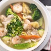 Wonton Soup · Our customers' favorite soup! Meat and vegetable filled wontons in a delicious soup made wit...